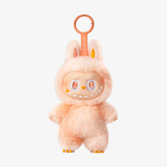 Zibuya Labubu Official keychain pendant figure from The Monsters Big Into Energy Series in soft orange with ring attachment and detailed fur.