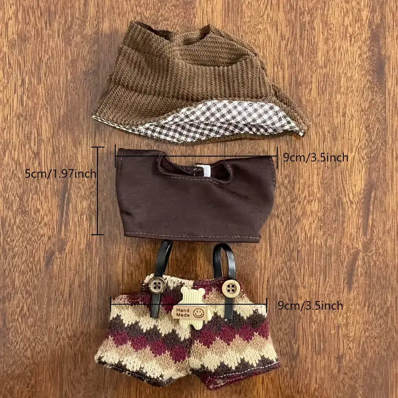 Set of miniature clothing items on a wooden surface with measurements indicated at Zibuya Official Store