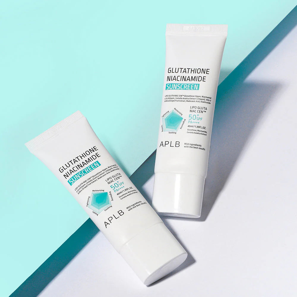Two tubes of APLB Glutathione Niacinamide Sunscreen on a light blue and white background, 50 SPF, No white cast, sunscreen for makeup at Zibuya Official Store