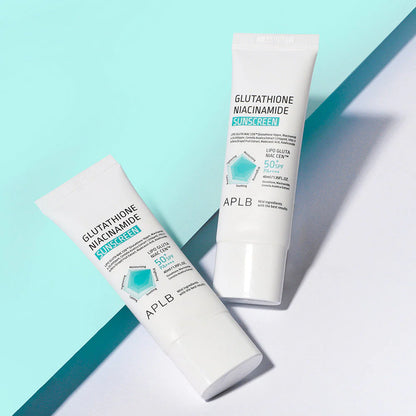 Two tubes of APLB Glutathione Niacinamide Sunscreen on a light blue and white background, 50 SPF, No white cast, sunscreen for makeup at Zibuya Official Store