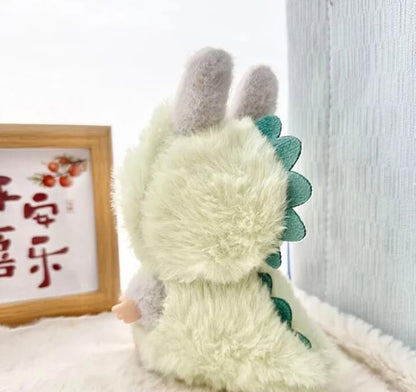 Cute Labubu doll wearing a fluffy green dinosaur costume from Zibuya.