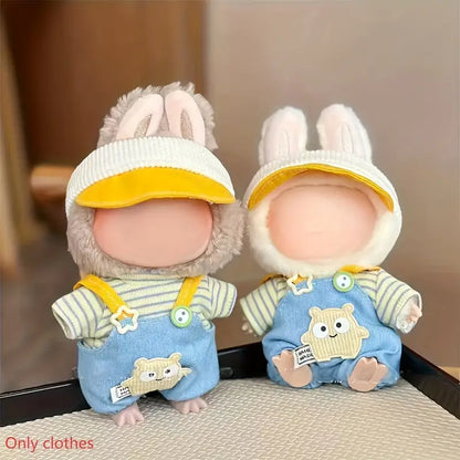 Two plush toys with bunny ears and outfits on a neutral background
