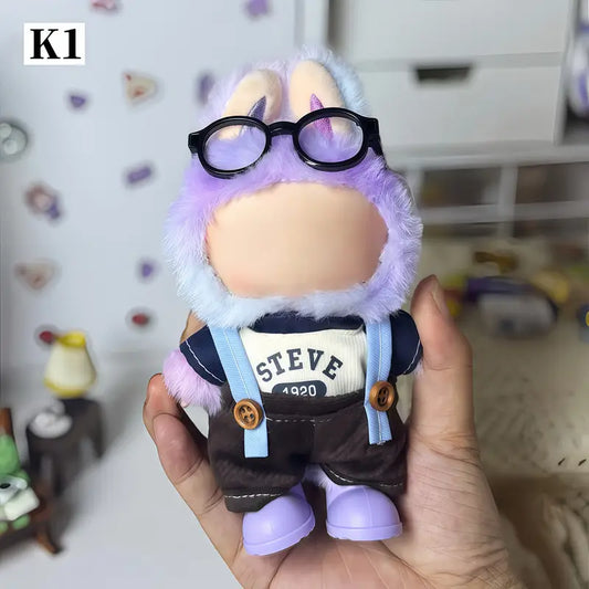 Plush toy resembling a character with glasses and a 'Steve' shirt held in a hand at Zibuya