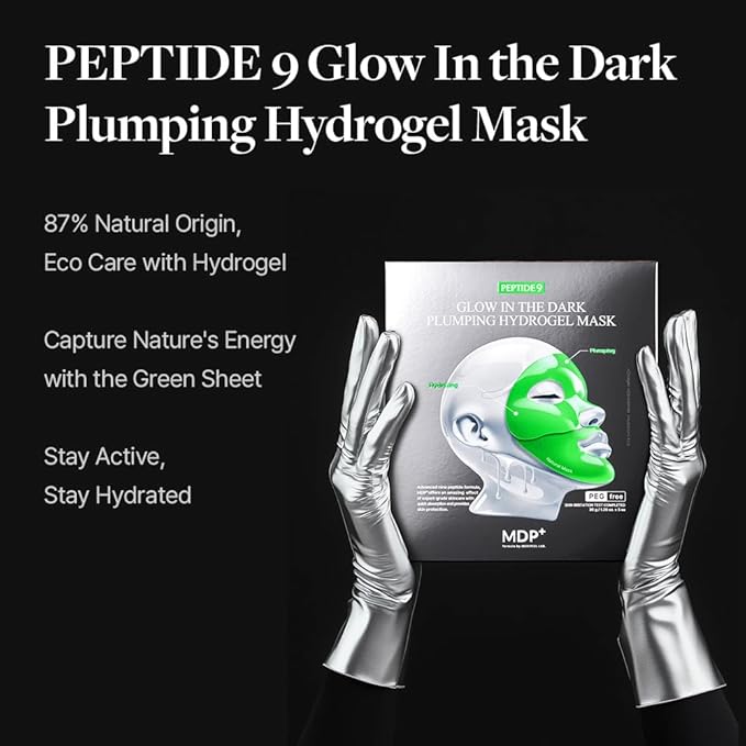 PEPTIDE 9 Glow In the Dark Plumping Hydrogel Mask packaging with hands wearing silver gloves on a black background.