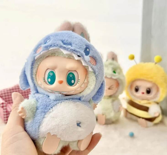 Limited edition Labubu shark outfit by Zibuya featuring a fluffy blue hoodie with shark fin and teeth design. Perfect kawaii plush fashion for collectors in USA and Canada.