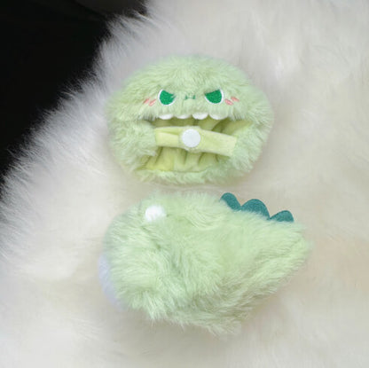 Adorable Labubu figure dressed in soft green dinosaur clothing by Zibuya.