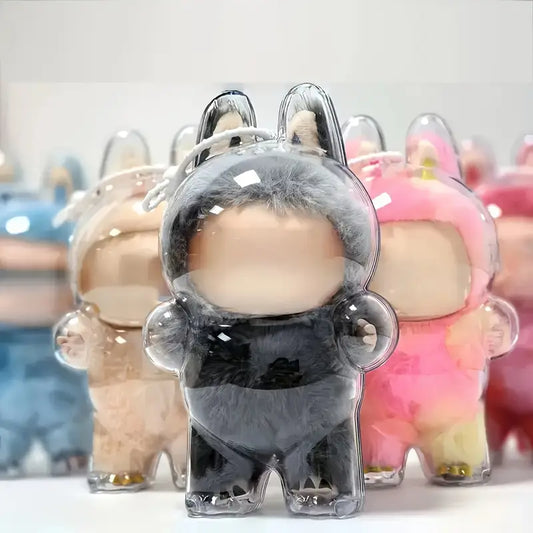 Zibuya clear standing acrylic protective case holding a black fur Labubu doll, with other colorful Labubu figures blurred in the background.